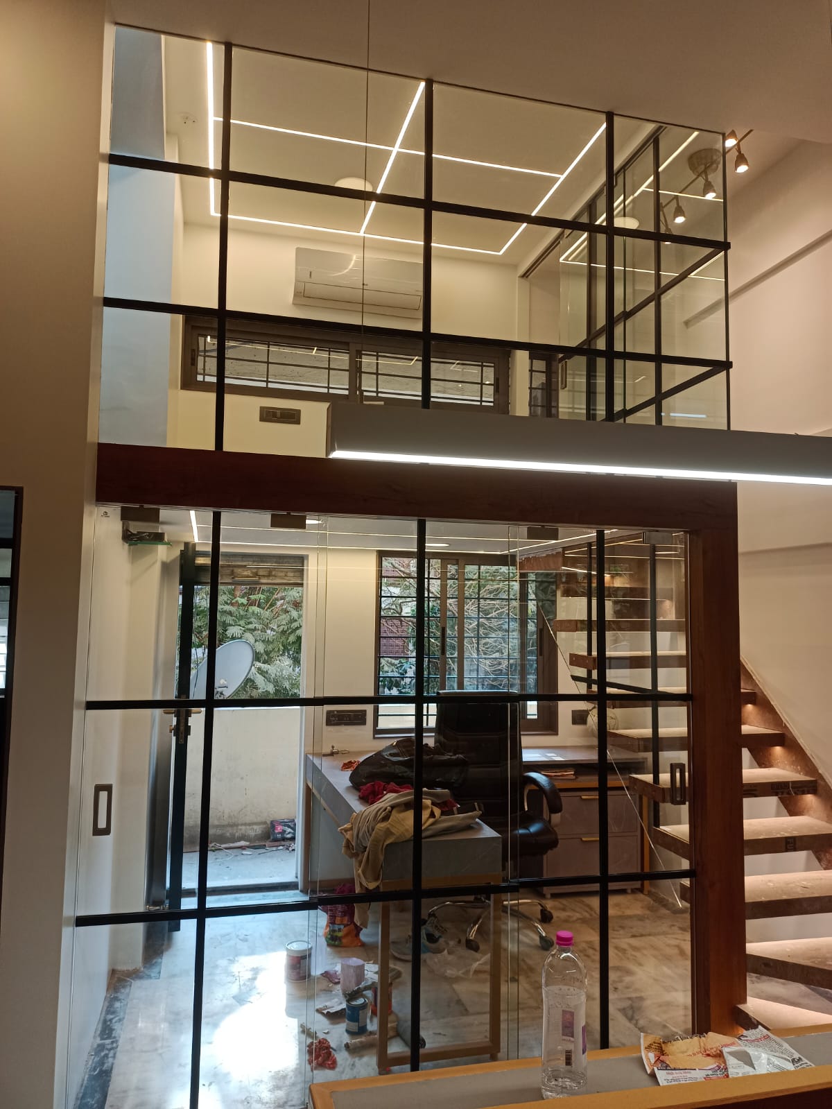 'Less is more' :  an Office interior for an investment firm at Oshiwara, Mumbai.